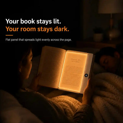 VisionGlow flat panel amber glow — your book stays lit your room stays dark — woman reading in bed at night while partner sleeps peacefully