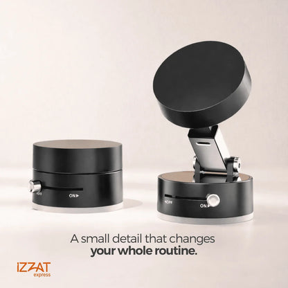 Side-by-side product shot of the Tazzi MagnaFold Phone Mount in two states: left folded compact position and right fully extended upright position — caption reads 'A small detail that changes your whole routine' with IZZAT Express logo